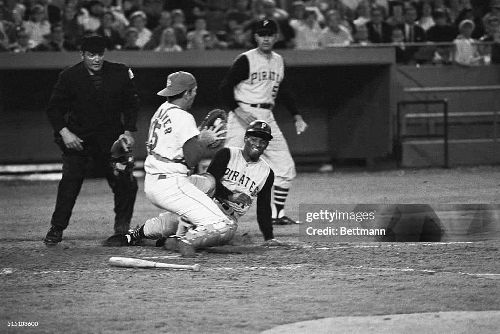 Roberto Clemente Trying to Score