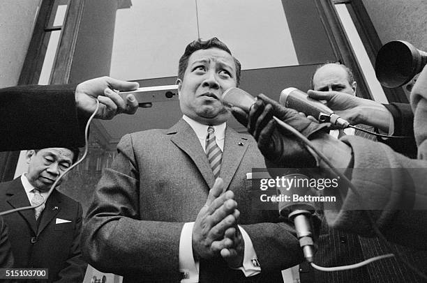 Prince Norodom Sihanouk of Cambodia gestures as he talks to newsmen outside Elysee Palace following meeting with French President Georges Pompidou....