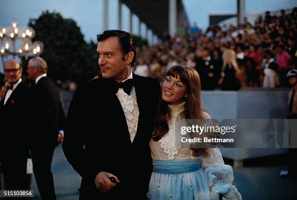 Playboy magazine editor Hugh Hefner is accompanied by Barbi Benton at the 1970 Academy Awards.