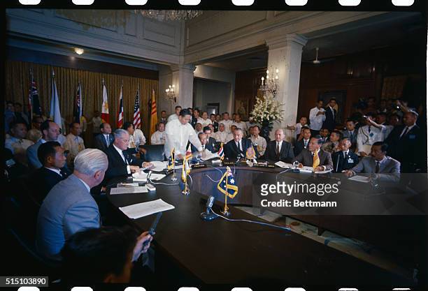 Photo shows leaders signing the Manilla summit agreement at Malcanang Palace. Left to right is Australian Prime Minister Harold Holt, South Korean...