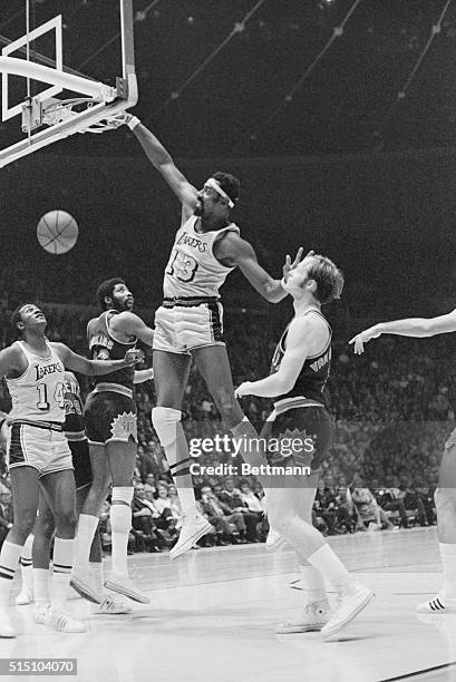 Inglewood, California: Ageless Wilt Chamberlain leads the Los Angeles Lakers attack with plays like the first period block of Sun's Gail Goodrich and...