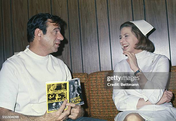 Actress Ingrid Bergman and actor Walter Mathau chat in dressing room between scenes of the movie Cactus Flower" at Columbia Pictures studio 2/14/69....