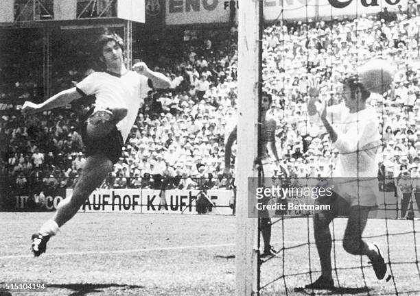 Germany's Gerd Mueller kicks winning goal past England's goal keeper Peter Bonetti in overtime of quarter-final of World Cup Soccer, 6/14. Germany's...