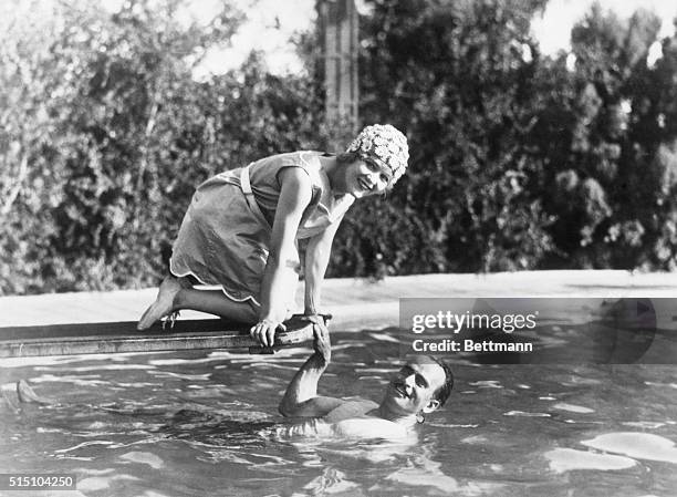 New York, NY- Actress Mary Pickford and actor Douglas Fairbanks, Sr., once wed to each other and co-stars in many films, enjoy a relaxing moment away...