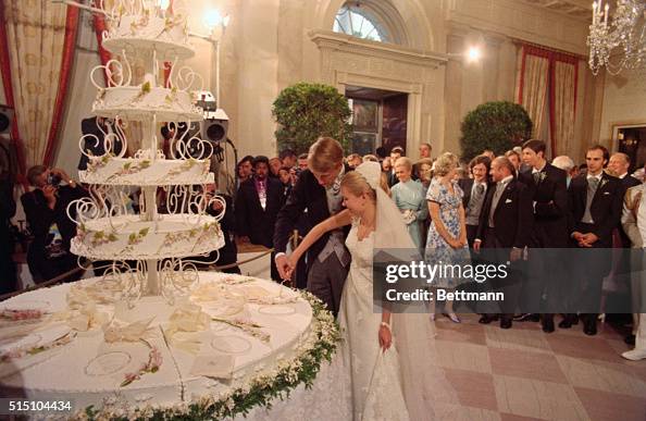 Edward Cox and Tricia Nixon Cutting Wedding Cake