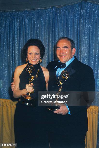 Hollywood, California: Actress Valerie Harper and actor Edward Asner hold their TV Emmy awards here. Miss Harper was named best supporting actress...