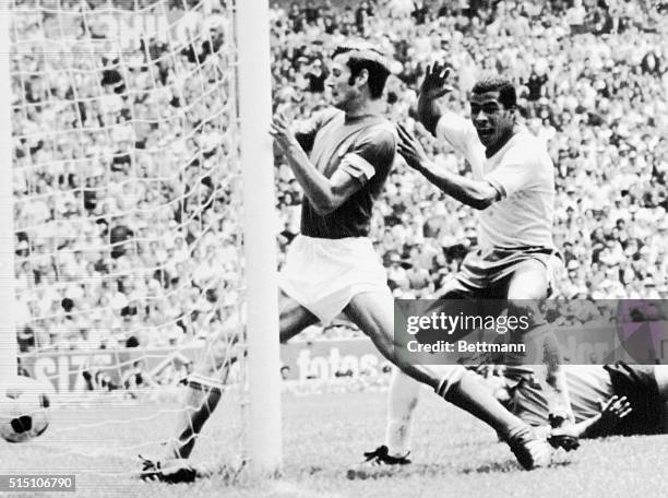 Moment of triumph for Brazil's Jairzinho as he scores a third goal during the World Cup Championship against Italy. To his left is Giacinto...