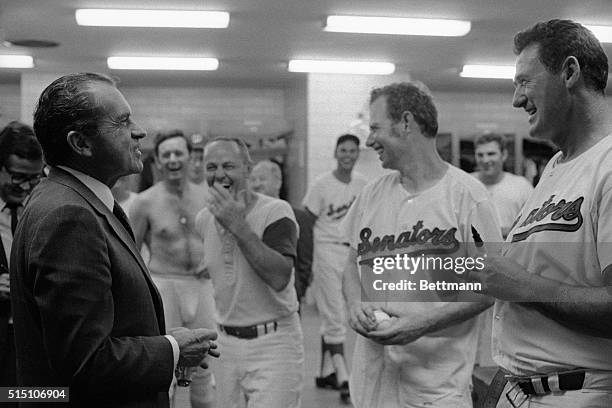 President Nixon went down into the dressing room here to congratulate the Washington Senators after he watched them defeat the Milwaukee Brewers at...