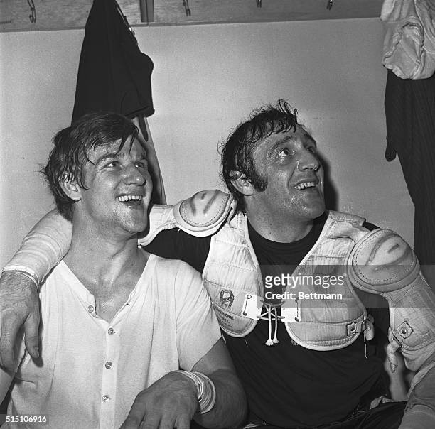Happy twosome are shown in the Boston Bruins' dressing room after the Bruins defeated the Oakland Seals 8 to 1 here 3/9. Bobby Orr set a goal-scoring...
