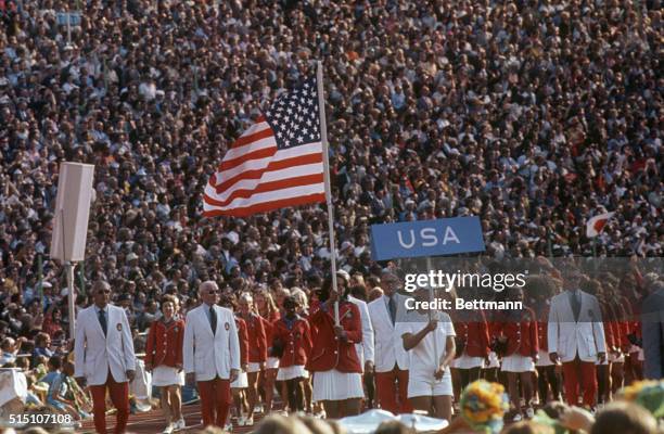 Munich, Germany: U.S. Olympic team enters the stadium during the opening ceremonies of the 20th Olympic games in Munich. Olga Connolly, wife of...