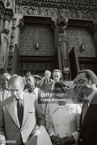 Pee Wee Reese and Monte Irvin , former baseball players, join other mourners as they leave the Riverside Church where they paid their respects to...