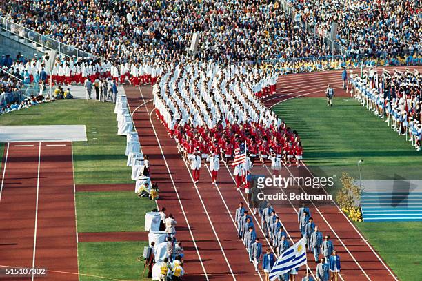 The U.S. Team enters the Olymoic Stadium during the opening ceremonies of the 20th Olympic Games, held in Munich, Germany. Olga Connolly, wife of...