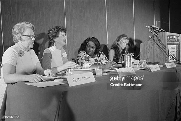 Some of the keynote speakers at the opening of the National Women's Political Caucus, enjoy a light moment. Left to right are : Betty Smith, former...