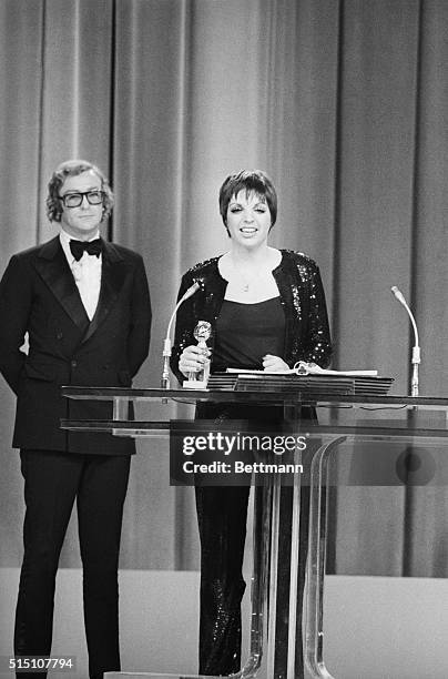 Hollywood: The Hollywood Foreign Press Association presents their Golden Globe awards. Best Motion Picture Actress-Comedy of Musical award was...