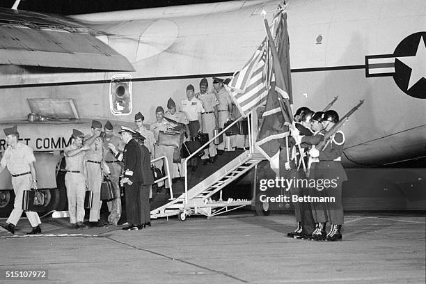 The last planeload of U.S. Troops pulled out of Vietnam is shown as they leave their plane on arrival here 3/29. They are greeted by Major General...