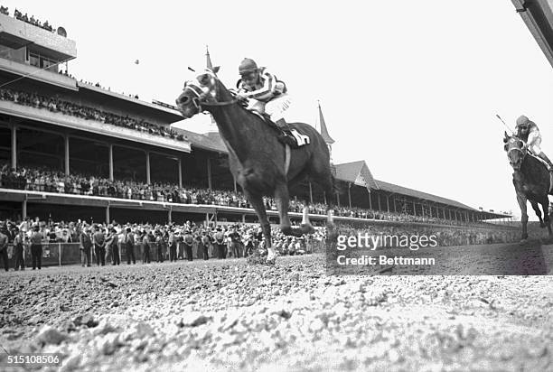 Secretariat with Ron Turcotte in the saddle wins the 99th running of the Kentucky Derby.