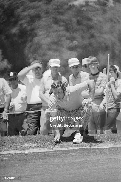Australian Bruce Crampton lines up a putt on the 18th and finished the second day of play with a 6-under-par 138 total to take the lead in the...