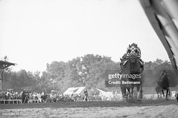 Secretariat comes to the finish line in the 98th running of the Preakness Stakes with Ron Turcotte in the irons. Sham with jockey Laffit Pincay Jr....