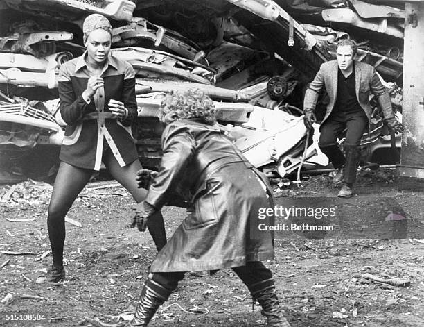 African American actress Tamara Dobson in a fight scene of the 1973 Warner Bros. "blaxploitation" film "Cleopatra Jones." Undated movie still.