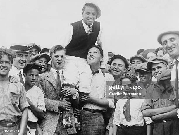 Golf Champion Greeted by Pals. Gene Sarazen, National Open champion, and now also champion of all the professional golfers in the country, after he...