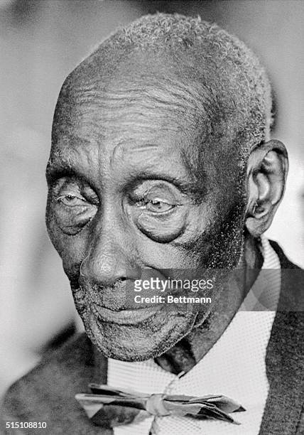 Former slave Charlie Smith, shown here in a photo taken last month on Father's Day, celebrates his 131st birthday on July 4, 1973. Smith was born in...