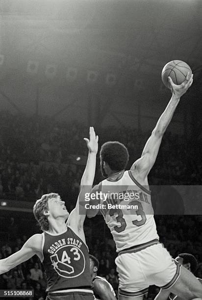 Milwaukee: Golden State Warriors Clyde Lee didn't have a chance as Milwaukee Bucks Kareem Jabbar held the ball way out of reach as he went for two...