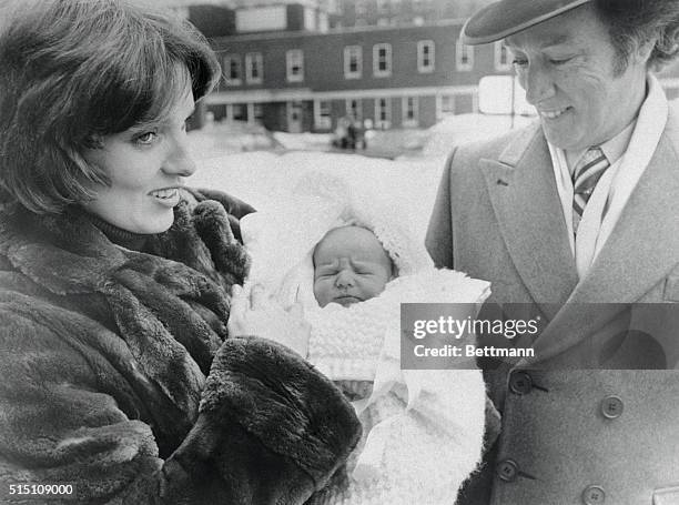 Ottawa: Prime Minster Pierre Trudeau and his wife Margaret are shown posing for their first photograph with their new-born son, Alexandre Emmanuel...