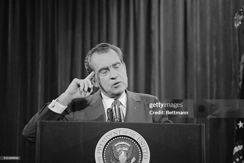 President Nixon Pointing to His Head