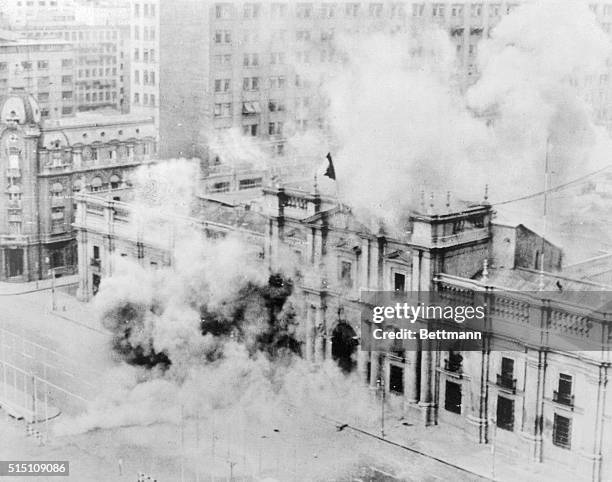 Chile's Presidential Palace burns at the height of bombardment during the coup d'etat by the nation's armed forces September 11.