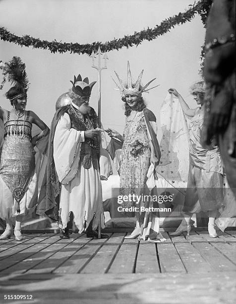 Atlantic City. N. J.: Miss Margaret Gorman with Hudson Maxim as "Neptune" at the Atlantic City Beauty Pageant.