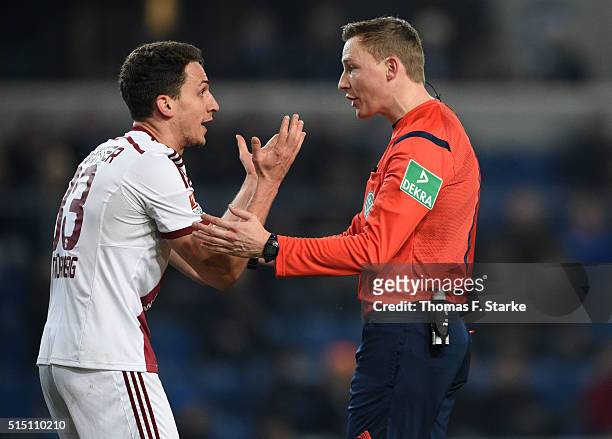 Georg Margreitter of Nuernberg argues with referee Martin Petersen during the Second Bundesliga match between Arminia Bielefeld and 1. FC Nuernberg...