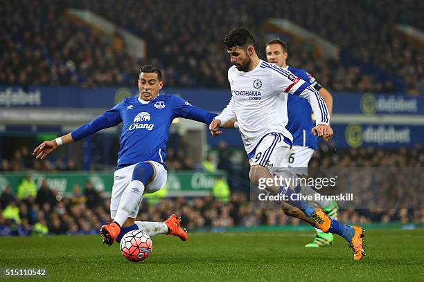 Diego Costa of Chelsea and Ramiro Funes Mori of Everton compete for the ball during the Emirates FA Cup sixth round match between Everton and Chelsea...