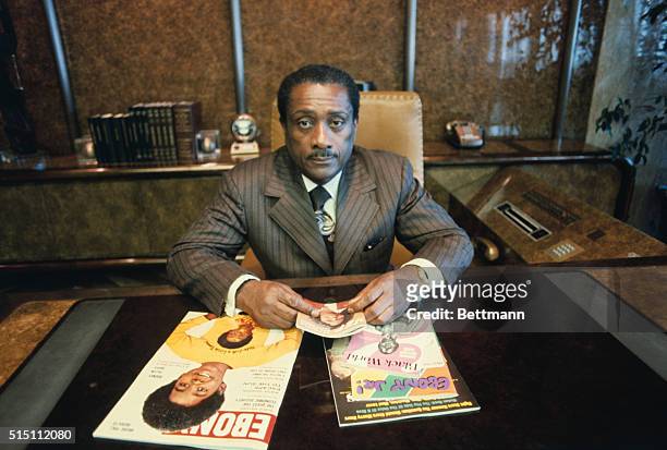 Portrait of American publisher and founder of the Johnson Publishing Company John H Johnson as he sits at his desk, Chicago, Illinois, February 1974.