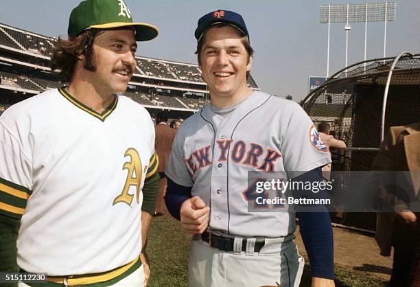 Jim Hunter of the Oakland A's and Tom Seaver of the NY Mets pose together before a game in the 1973 World Series.