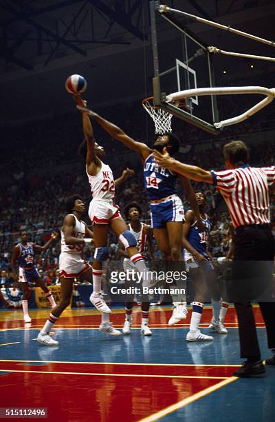 The Nets' Julius Erving is shown rising to the occasion against the defunct Utah Stars during a 1974 playoff game at New York's Nassau Coliseum....
