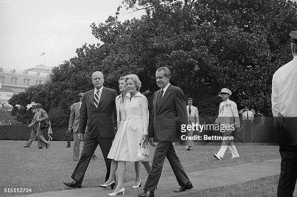 Mrs. Pat Nixon seems to be fighting back tears here, as she leaves the White House for the last time as the First Lady. Betty Ford, the new First...