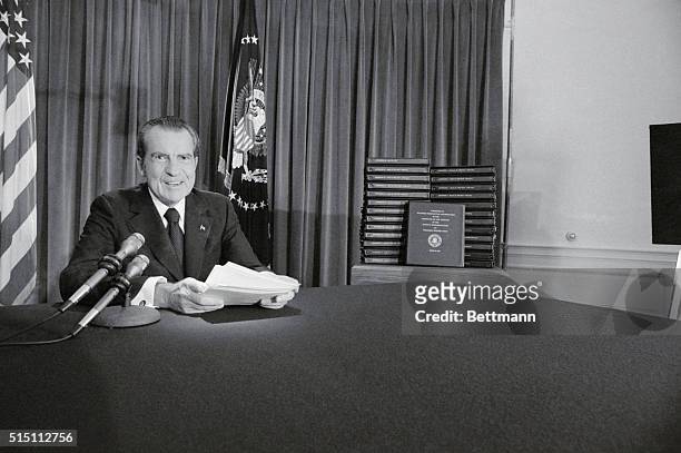 President Nixon, conceding that his refusal to surrender secret White House tapes had "heightened the mystery about Watergate" and caused suspicions...