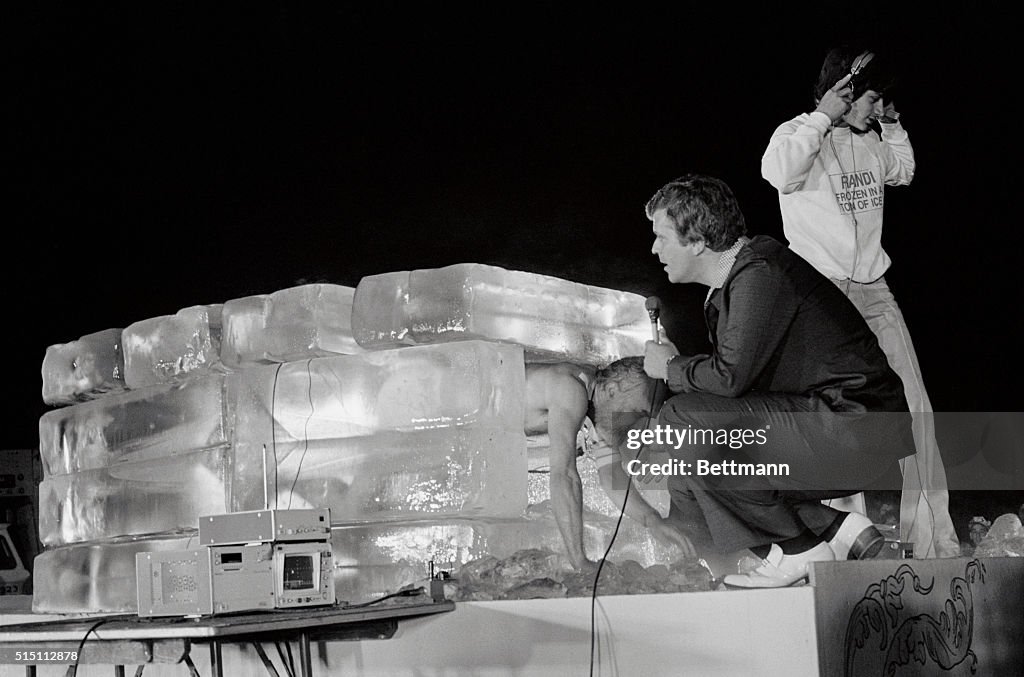 Magician Randi Magician James Randi, known as the Amazing Randi, in shorts, crawls ...