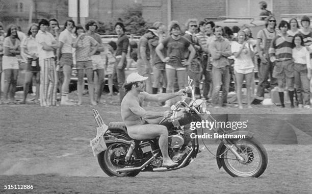 Nude man on a Harley Davidson motorcycle drove across the field during the half time of the Ohio University-Miami University rugby game. The game was...