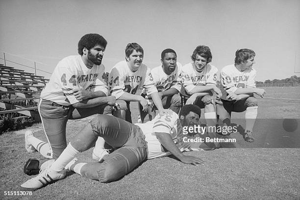 Members of the Super Bowl champion Pittsburgh Steelers pose for pictures as the AFC pros opened training. Franco Harris, Andy Russell, L.C....