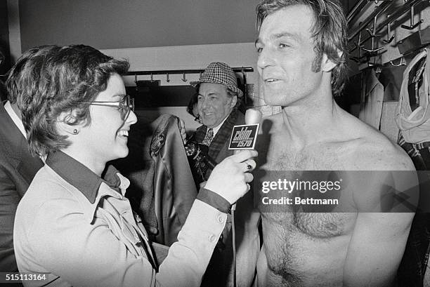 Canadian sports reporter Marcelle St. Cyr of Montreal French-language radio station CKLM, interviews Guy Lafleur of the Montreal Canadiens in the...