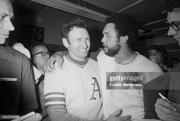Oakland: Oakland A's manager Alvin Dark , seen being embraced by slugger Reggie Jackson in the happy A's dressing room after their World Series...