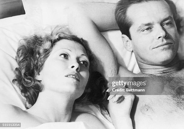 Faye Dunaway and Jack Nicholson are shown in a scene from the movie "Chinatown."