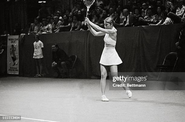 Contrasts in backhands showed as Billie Jean King displayed orthodox form against her opponent Chris Evert, who used both hands during their finals...