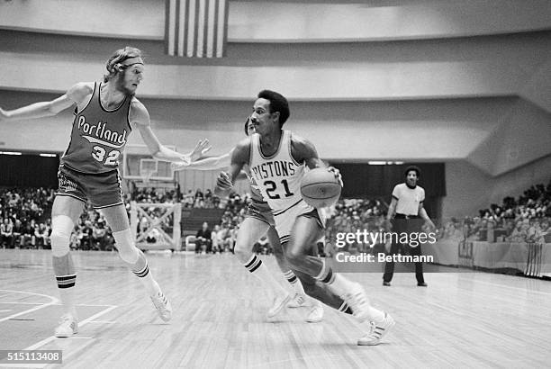 Detroit: Pistons' Dave Bing drives past Trail Blazers' Bill Walton , on his way to an easy basket during the first half of the Detroit-Portland game...