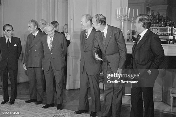 This Way. Rambouillet: French President Giscard D' Estaing invites Prime Minister Harold Wilson to move in closer for "La Photo de Famille". Japan's...