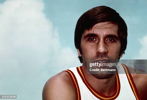 Close up of Rudy Tomjanovich, basketball player for the Houston Rockets in his uniform. Undated color slide.