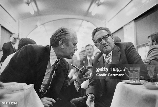 In the dining car on the train from Vladivostok to the airport on November 23 President Gerald Ford discusses progress on the S.A.L.T. Agreement with...