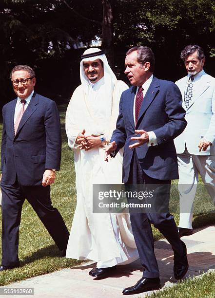 Washington, D.C.: President Richard Nixon shows Prince Fahd ibn Abdual Aziz Saud, Saudi Arabian Minister of the Interior, around the White House Rose...