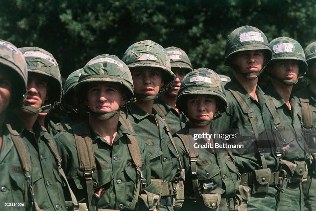 Female Soldiers in Green Uniforms